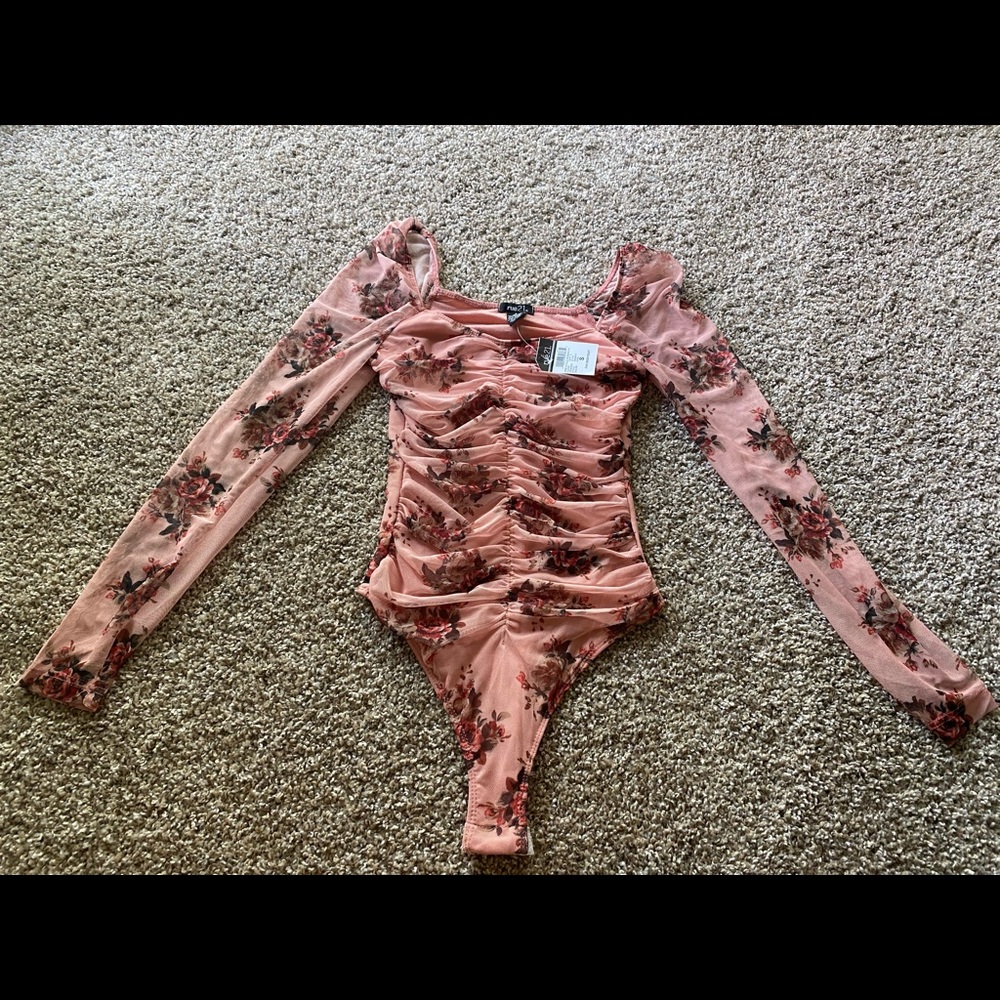 Pink bodysuit with flowers